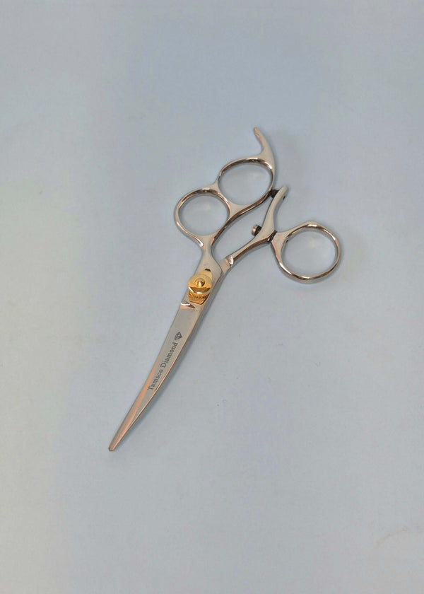 Tijeras curvas Sabre de 6" con pulgar giratorio y triple anilla